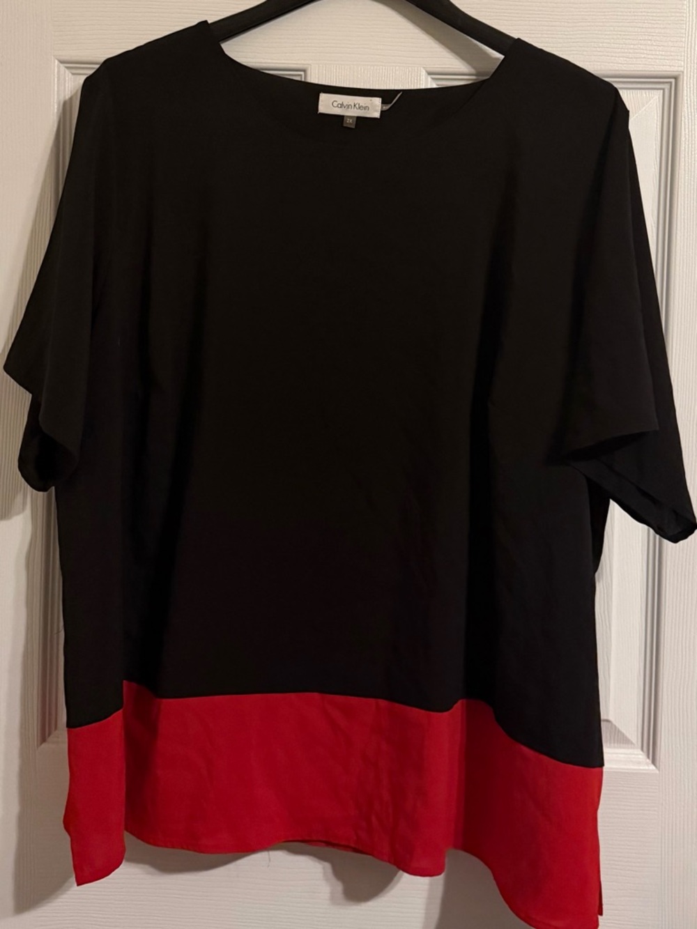 Calvin Klein Black Top with Red Hem